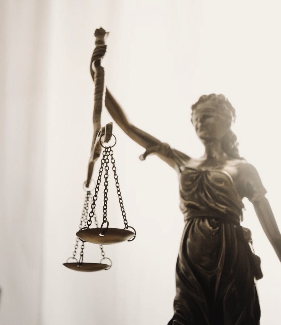 Scales of justice on an attorney's desk